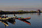 Inle Lake Myanmar. All the buildings are constructed on piles. Residents travel around by canoe, but there are also bamboo walkways and bridges over the canals, monasteries and stupas. 